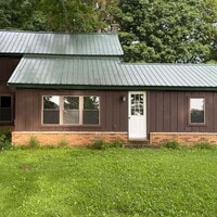 Building Photo - Updated Farmhouse for rent in private sett...