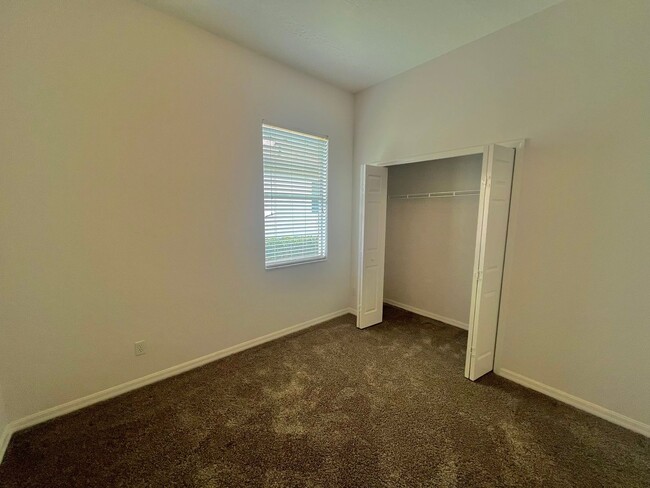 Building Photo - Spacious 4-Bed, 3-Bath Home in Guard-Gated...