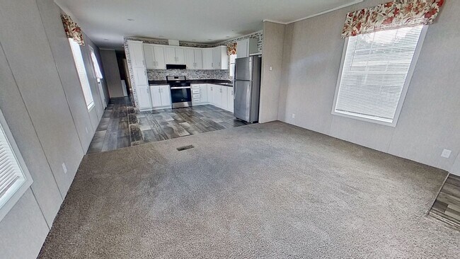 Building Photo - Move-In Ready Mobile Home with Upgrades!