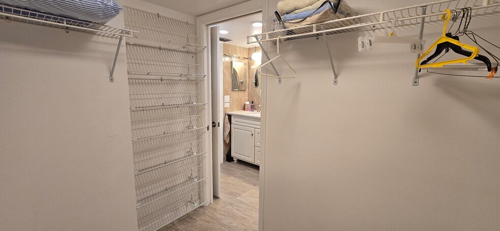 Master walk-in closet - 14255 Rosemary Ln