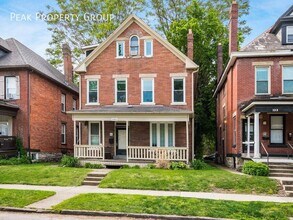 Building Photo - 131 W 8th Ave