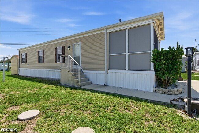 Building Photo - 5558 Palm Beach Blvd