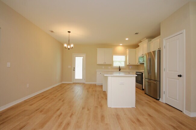 Building Photo - Enjoy Country Living with Modern Comforts!  3BR/2BA Home  with Granite Countertops, Covered Porch...