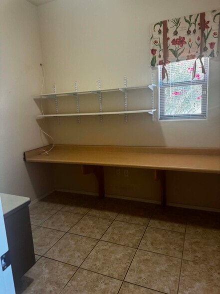 Office with shelves and desk - 4579 S Camino del Tejon