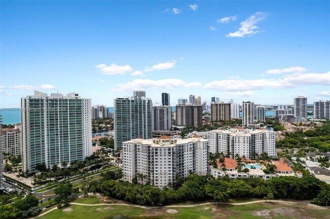 Building Photo - 20000 E Country Club Dr