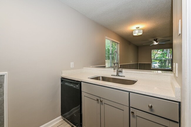 Building Photo - Neptune Beach Townhouse - On Huge Lot in Q...