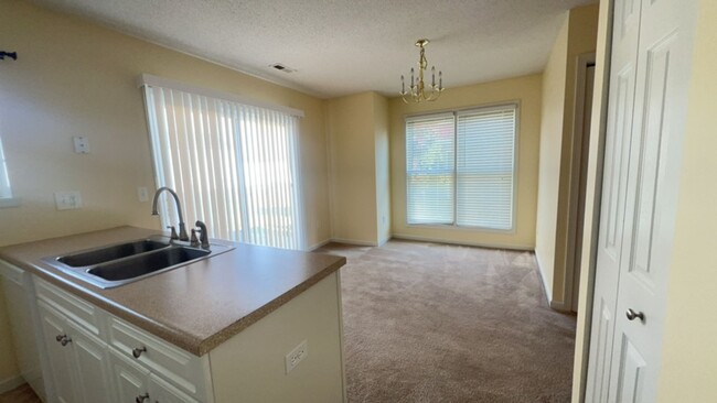 Building Photo - Spacious 3-Bedroom End Unit in Liberty Squ...