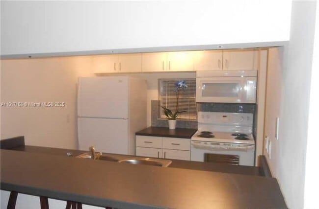 Building Photo - 8540 N Sherman Cir