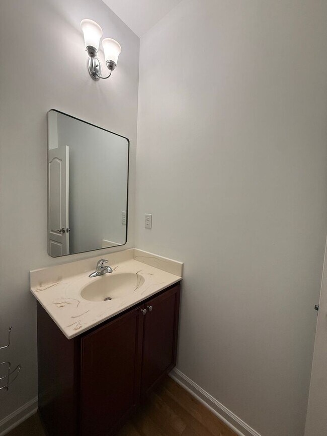 Building Photo - Spacious End-Unit Condo with Dual Primary Suites & Bonus Room