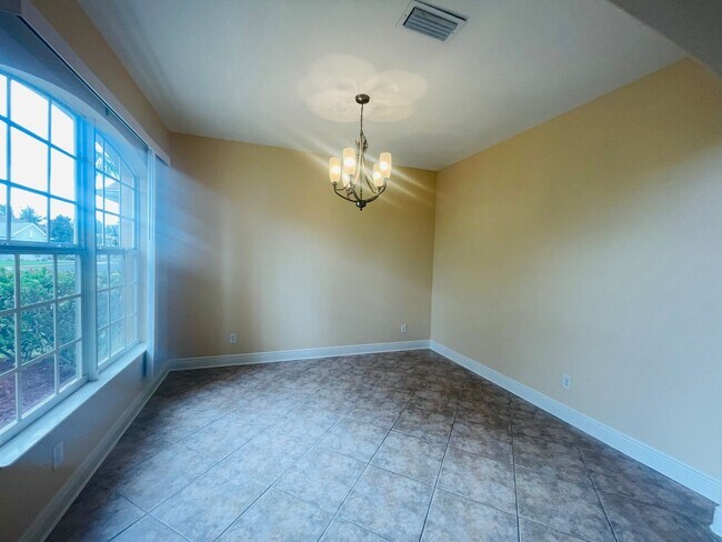 Building Photo - **SUNCOAST LAKES GATED COMMUNITY**