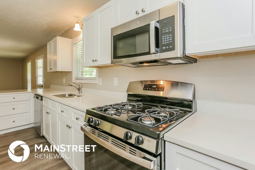 Building Photo - 6165 Marilla St