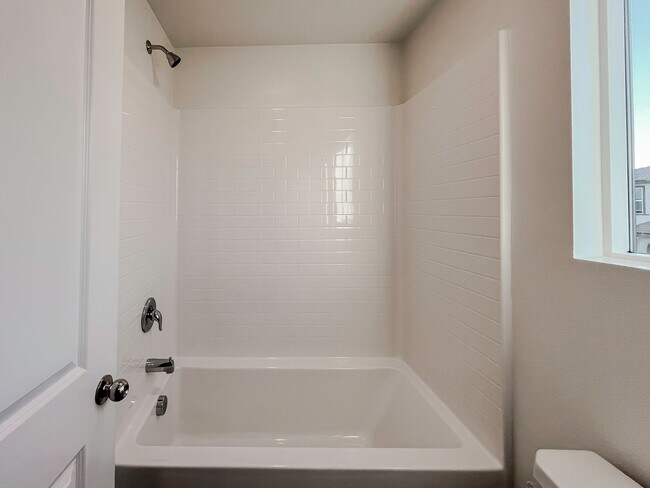 Building Photo - NEWER CONSTRUCTION ~SOLAR~ 3 BED 3 BATH BE...