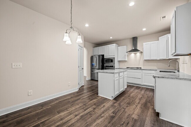 Building Photo - Spacious 4-Bedroom Retreat with 2.5 Baths ...