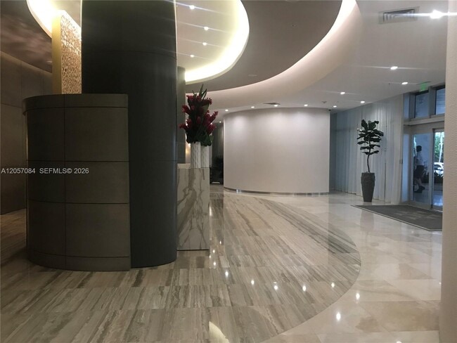Building Photo - 10275 Collins Ave