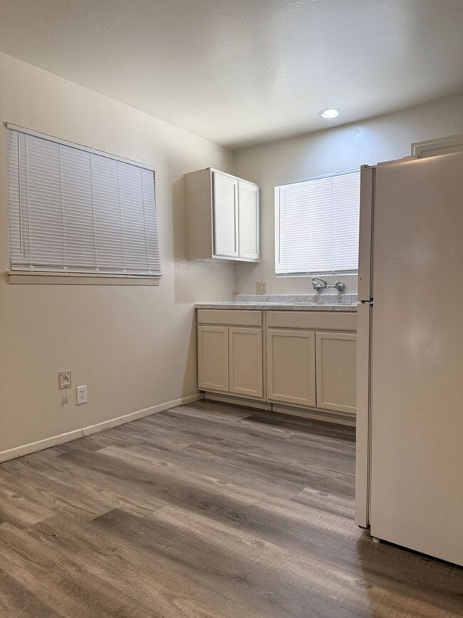 Building Photo - Cozy Studio With Designated Carport!