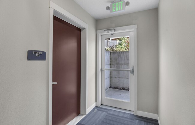 Building Photo - Modern Ground-Level Condo in River Terrace...