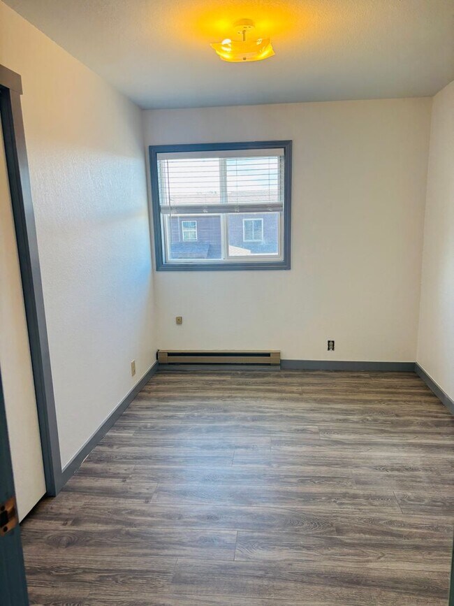 Building Photo - Renovated 3BR condo w/ garage & private yard **MOVE IN SPECIAL - See details below**