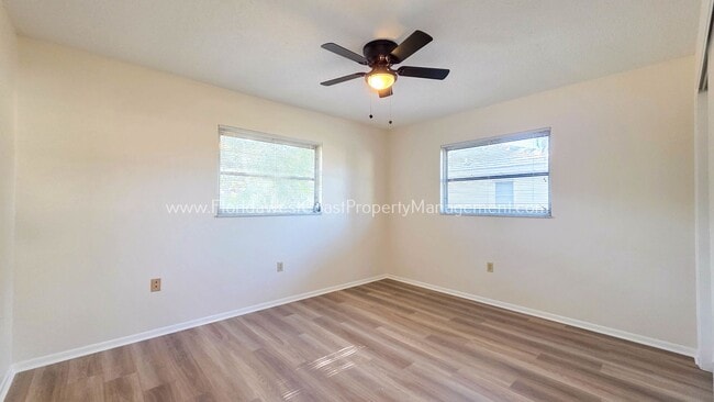 Building Photo - SPACIOUS SARASOTA HOME WITH LARGE FENCED YARD! MOVE IN READY! ALL TILE/ NEW LVP!