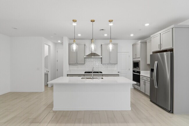 Building Photo - Experience refined living in this beautifully appointed 3-bedroom, 2.5-bathroom townhome spanning...