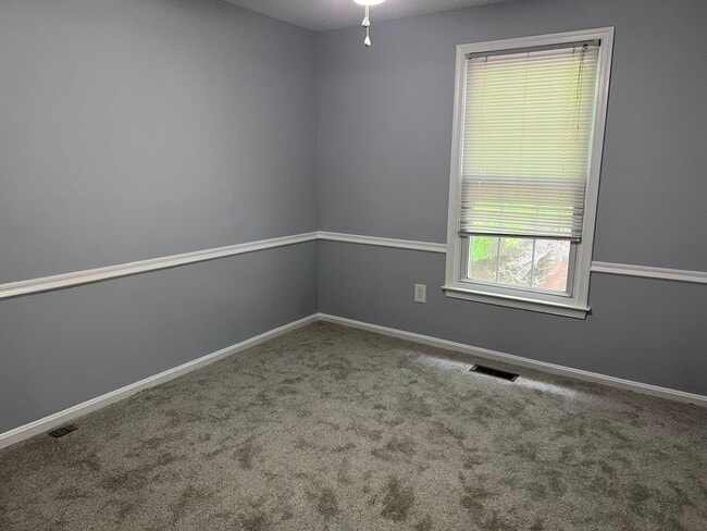 Building Photo - Stunning Three Finished Level Townhome Clo...