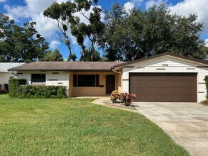 Building Photo - Spacious 3/2/2 in a quiet neighborhood ava...