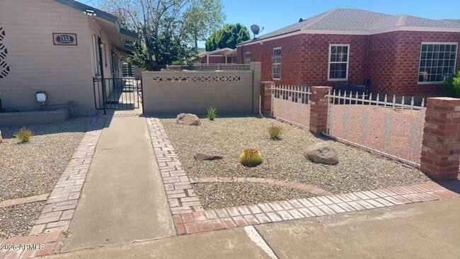 Building Photo - 7153 N 57th Dr