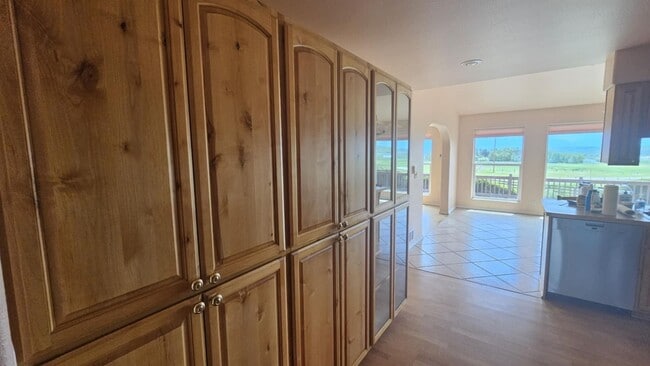 Building Photo - Out of town house with double garage and l...