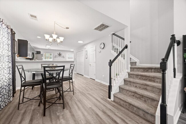 Building Photo - This immaculate 3-bed, 2.5 bath townhome in the Olde Stone Crossing community with the primary be...