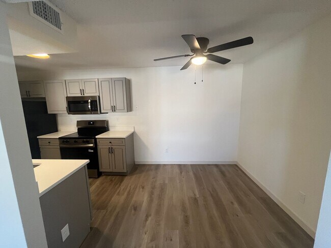 Building Photo - GORGEOUSLY REMODELED 2 bed 2 bath on 3rd floor with vaulted ceiling and skylight and in unit W/D!!