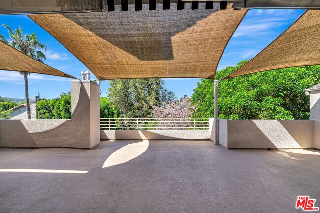 Building Photo - 4477 Woodman Ave