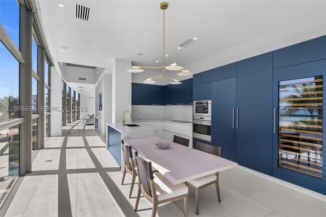 Building Photo - 5875 Collins Ave