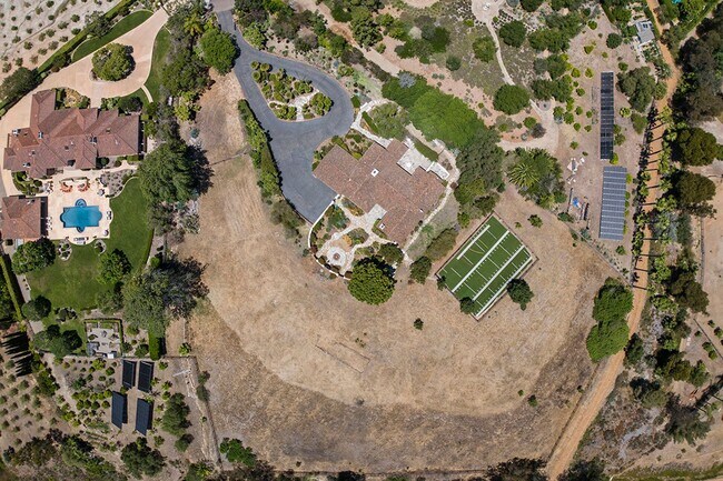 Building Photo - This Beautiful Hacienda Style Home combine...