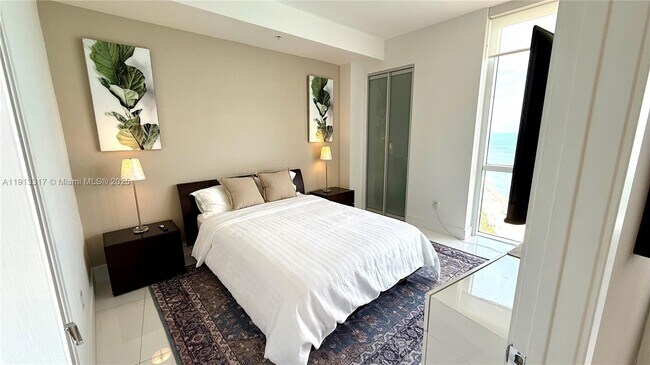 Building Photo - 18201 Collins Ave