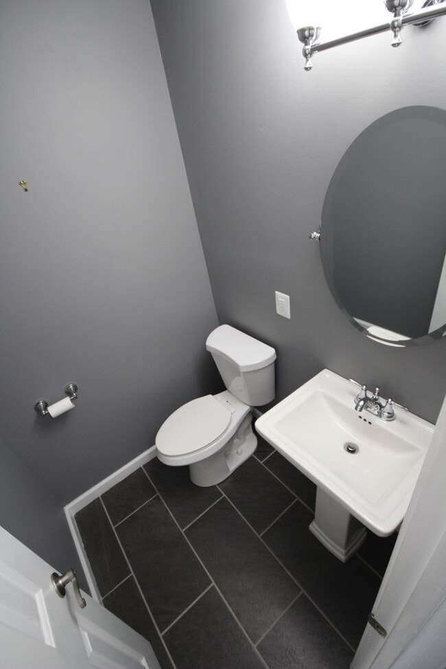 Building Photo - *Coming Soon*  Upgraded End Unit Townhome ...