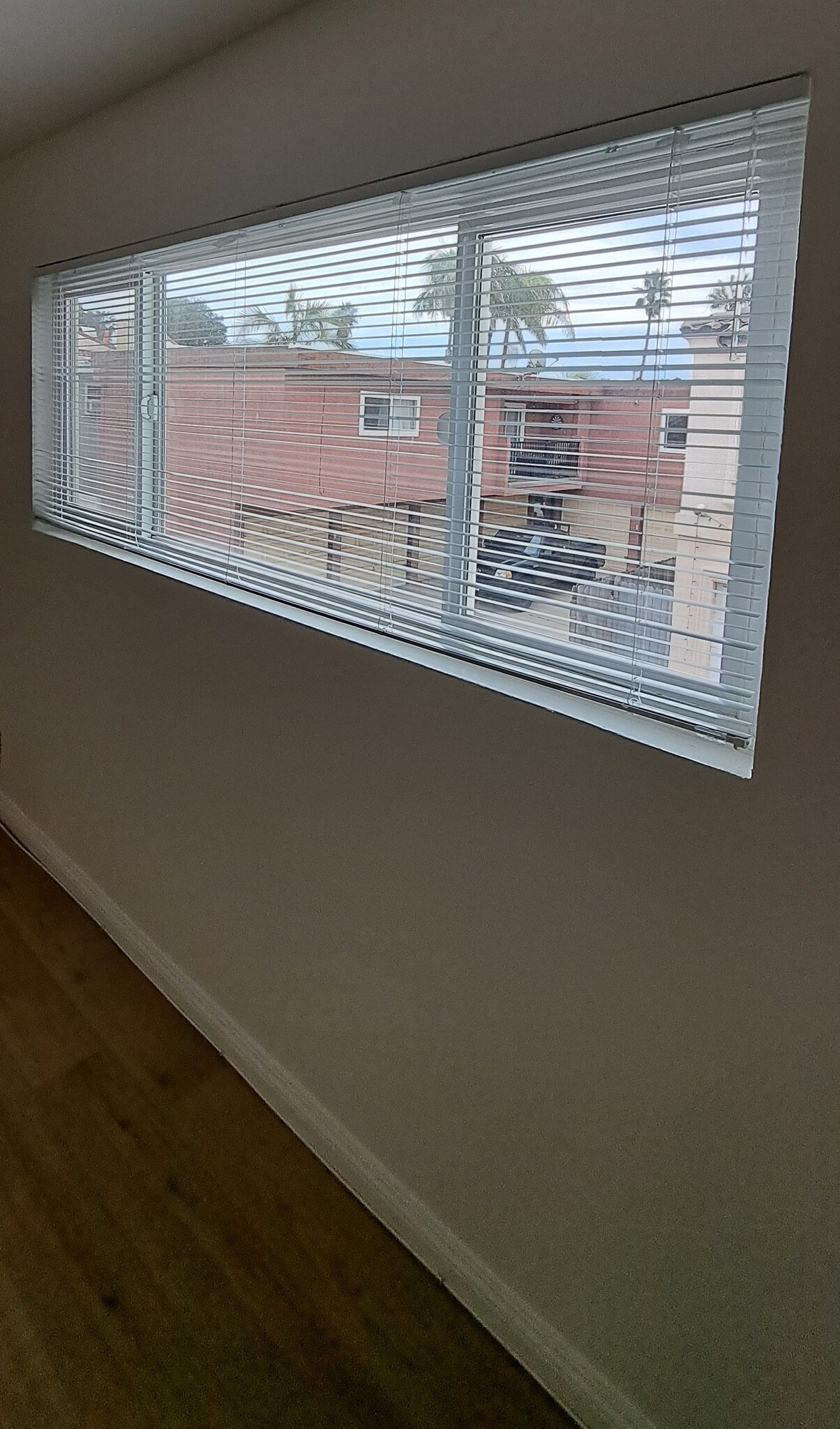Large 2nd bedroom with large window and mirrored closet doors. - 314 20th St