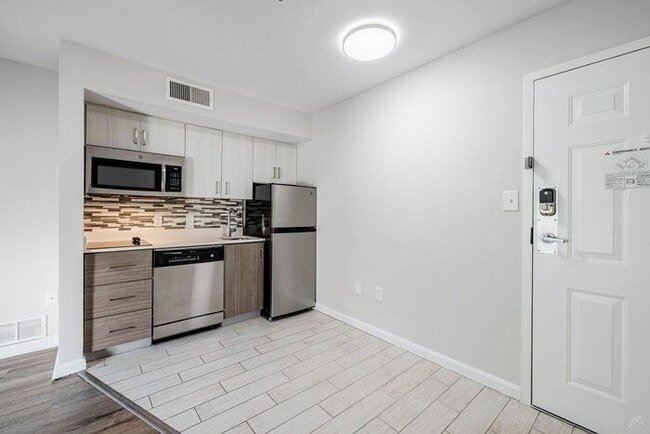 Building Photo - The Spoke at Peachtree Corners- Fantastic Accessibility and Great Prices! Call Now! 678-535-9535