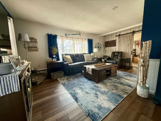 Building Photo - Quaint 2 bedroom, plus den, 1 bath on Okauchee Lake Appliances included: Microwave, Stove, Refrig...