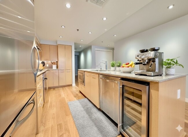 Building Photo - Exquisite Condominium at the Renowned Waterfront Pearl with Views of the River, Work Out Facility...