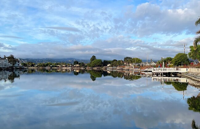 Building Photo - OPEN HOUSE 11AM-1PM Sunday 7/19 - Rare prime waterfront home right on the San Mateo Lagoon, avail...
