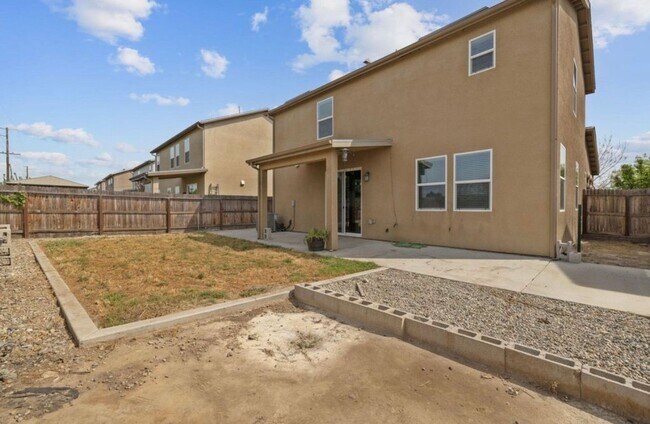 Building Photo - SE Two story home coming soon
