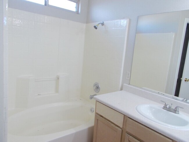 Building Photo - Spacious 4-Bedroom, 2.5-Bathroom Home with...