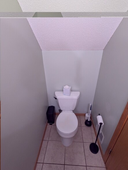 Downstairs bathroom toilet - 6186 S Pointe Dr SW