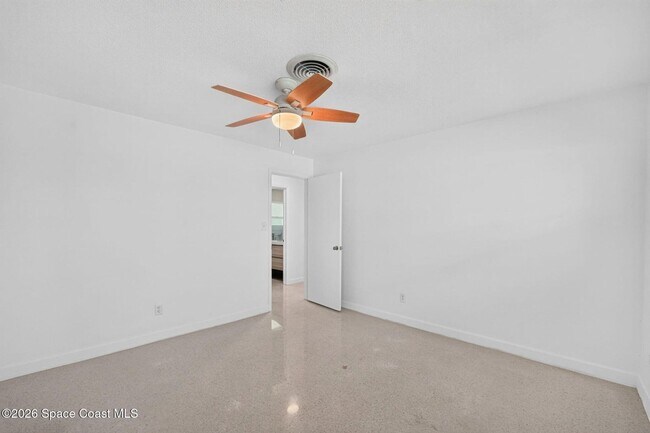 Building Photo - Welcome to this beautifully remodeled 4-bedroom, 3-bath home in the heart of Indialantic Beach!