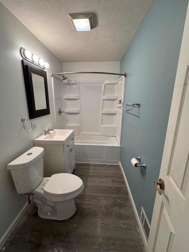 Building Photo - 210 E Charles St