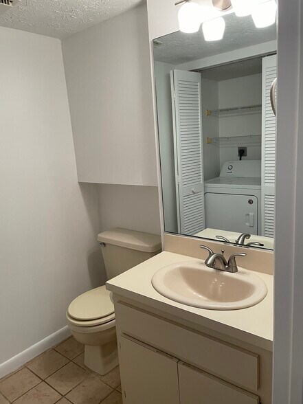 Downstairs half bath with laundry - 810 SE 2nd St