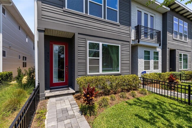 Building Photo - 8673 Tavistock Lakes Blvd