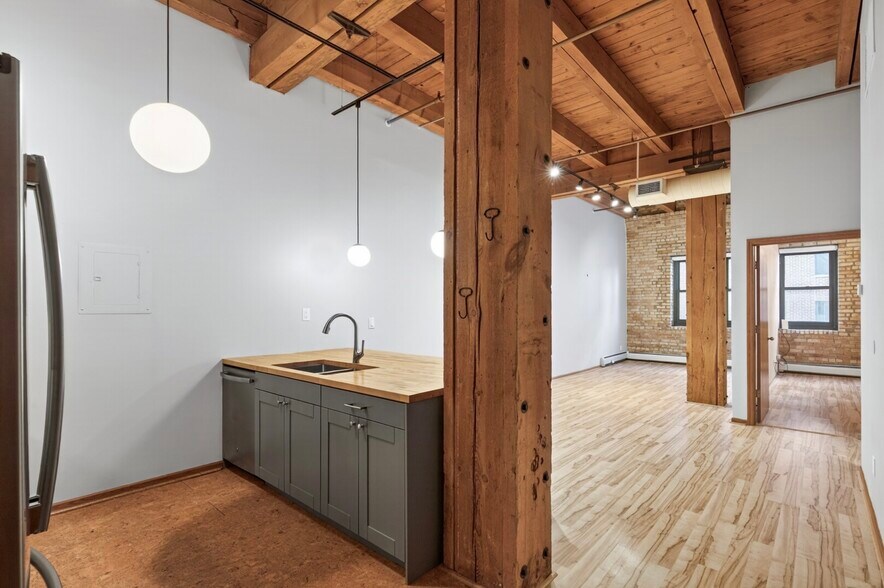 14 foot ceilings with exposed brick - 400 N 1st St