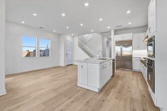 Building Photo - Large Modern Town Home with Oversize Backyard Guarded Luxury Neighborhood