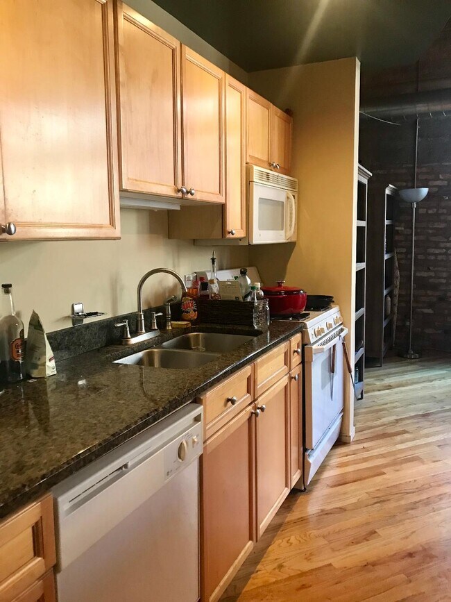 Maple kitchen cabinets - 2300 W Wabansia Ave