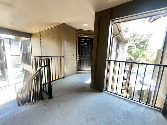 Building Photo - NEW-Remodeled bathroom & kitchen! NEW VINYL PLANK flooring & fresh paint! 2 bedroom 1 bath condo ...